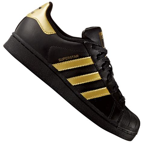 schwarze adidas sneaker mit goldstreifen|Schwarze, goldene adidas Superstar .